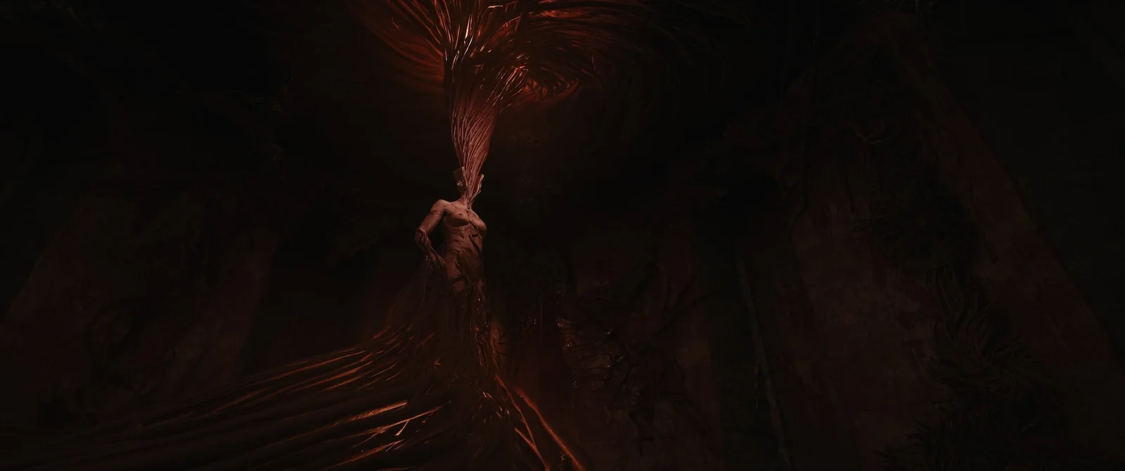 A pale figure bound in a column of red flesh-like tendrils in a dark cavern
