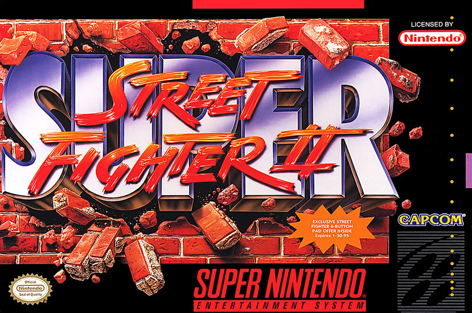 The Super Nintendo box for Super Street Fighter II, its logo bursting out of a red brick wall
